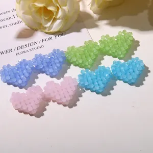 Handmade beaded heart charms DIY jewelry accessories colorful detailed showcase shot