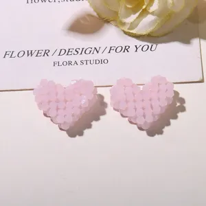 Pink beaded heart detail shot, perfect for DIY jewelry making, hair clips and fashion accessories.