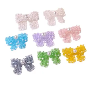 Colorful beaded pearl bow DIY accessories set in various sweet macaron shades for styling.