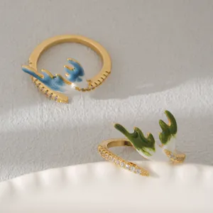 Stainless steel open ring with enamel drip oil antler design and synthetic cubic zirconia.