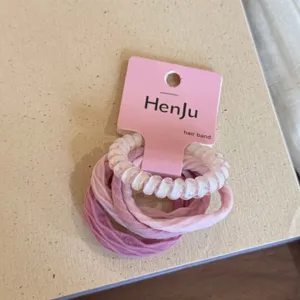 Pink hair tie set featuring clear glitter telephone wire and soft velvet bands, sweet style.