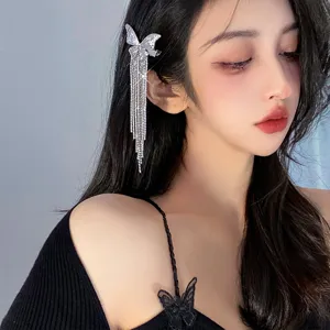 Pinza de pelo de mariposa con diamantes de imitación y cadenas de borlas largas, elegante.