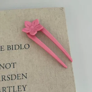 Pink flower U-shaped hair fork detail view, chic minimalist hair styling accessory for women daily wear.