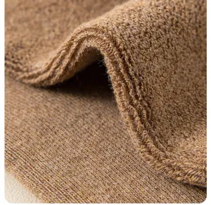 Brown thermal fleece-lined men winter socks detail macro shot, soft thick loop knit sock.