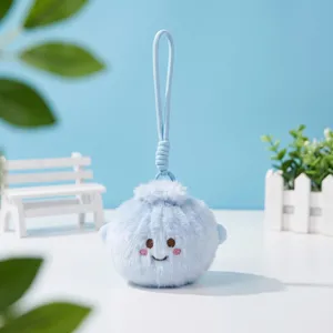 Cute blue stuffed bun plush keychain detail shot, fluffy toy charm with cute embroidered face.
