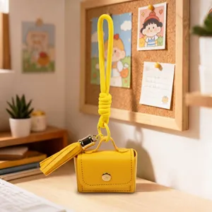 Kreative PU-Leder Mini Tasche Schlüsselanhänger, gelbe Geldbörse mit Quaste, stylisches Accessoire.