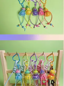 Colorful gradient gourd keychain with braided lanyard, cute handmade bag pendant accessory and charm.