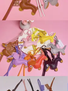 Cute leather dachshund bag charm keychain with chocolate pendant and strap for diy decoration.