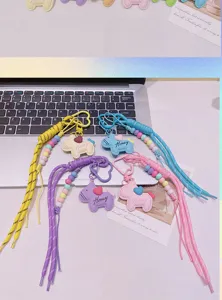 Cute resin pony keychain and bag charm with colorful beads, perfect DIY accessory for keys.