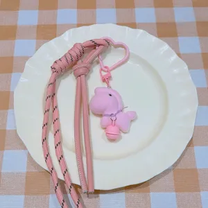 Cute pink plush horse bag charm with woven lanyard and heart clasp for daily decoration.