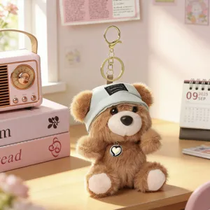 Cute scented plush bear keychain pendant, detailed view of fluffy bag charm doll.