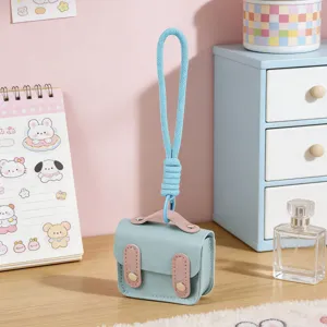 Grazioso mini zaino astuccio auricolari in pelle PU portachiavi ciondolo per donne e ragazze.