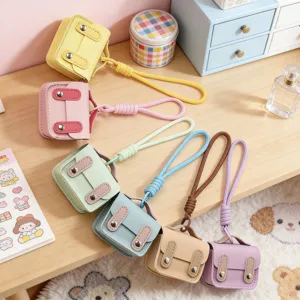 Mini zaino in pelle PU portachiavi simpatico auricolare portamonete ciondolo accessori
