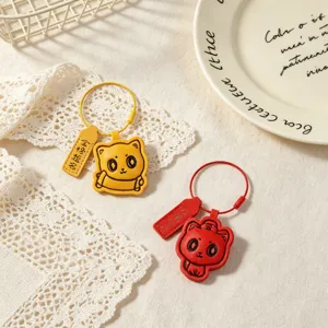 Cute leather keychain with good luck charm tag, creative student graduation gift pendant.
