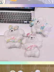 Mignon porte-clés chien en peluche avec robe florale, charm de sac doux et cadeau.