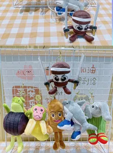 Cute plush keychain toy detail showing various funny animal doll pendants for bags.