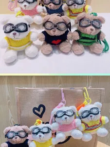 Cute plush bear keychain with cool goggles and sweater, ideal backpack pendant or bag charm.
