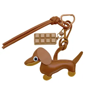 Cute leather dachshund dog bag charm with chocolate pendant and stylish lanyard keychain accessory