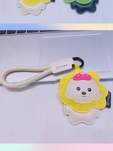 Süßer PU-Leder Cartoon Welpe Hund Schlüsselanhänger Anhänger mit geflochtenem Gurt für Taschen.
