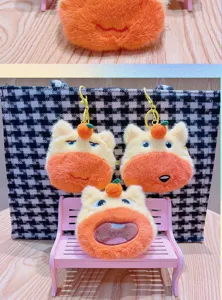 Cute capybara plush coin purse keychain, soft cartoon orange doll pendant for bags and keys.