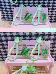 Grüner Öl schwimmend Treibsand Flasche Schlüsselanhänger Acryl Anhänger Taschen Deko Accessoire