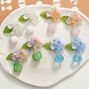 Handcrafted crystal glass flower earrings DIY accessories, colorful floral drop charms for jewelry making.