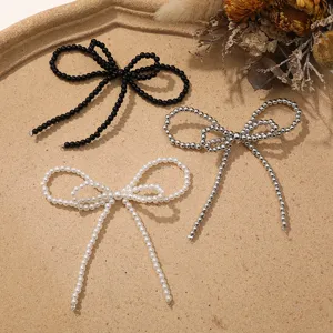 Imitation pearl bow DIY shoe charms clothing accessories bag pendants set in black silver white.