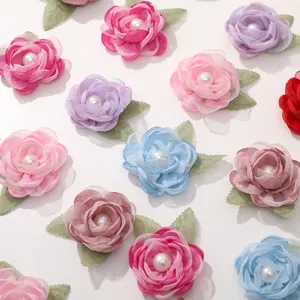 Colorful mesh fabric rose flowers with pearls and green leaves for DIY hair accessories crafts.