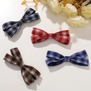 Korean style retro plaid bow hair clips set, cute fabric side clips for daily hair styling.
