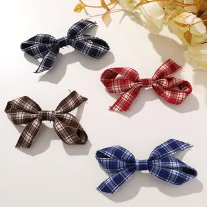 Korean vintage plaid fabric bow hair clip set detail showing four colors and textures.