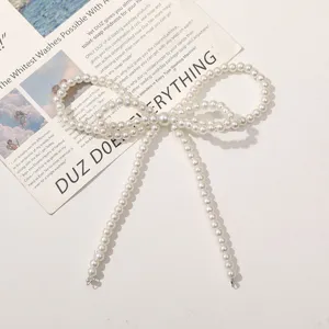 Faux pearl bow knot DIY handmade shoe charm bag pendant jewelry accessory for women.
