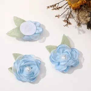 Light blue mesh flower DIY accessories with pearl and green leaves for handmade hair clips.