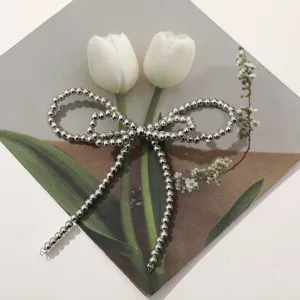 Silver metal beaded bow DIY accessory, perfect for shoes, bags, and handmade jewelry crafting.