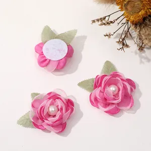 Exquisite pink mesh pearl flower detail shot, perfect for DIY hair accessories and crafts.