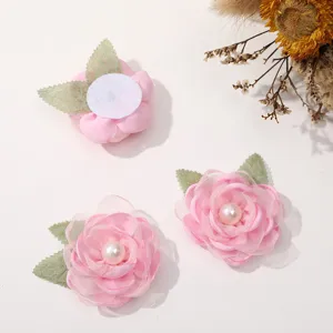 Pink mesh pearl flower DIY accessory detail showing petals, leaves and back patch.