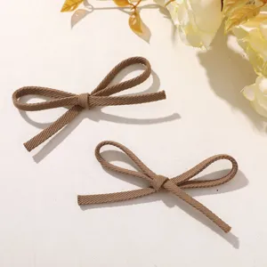 Brown fabric bow detail, perfect for DIY shoe flowers, bags and hair clips. Cute and stylish.