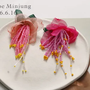 Fatto a mano perline fiore lunga nappa fermaglio gioielli accessori DIY dettaglio foto