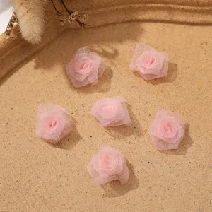 Mini pink mesh rose flower heads for DIY handmade garment accessories, crafts, and hair bows.