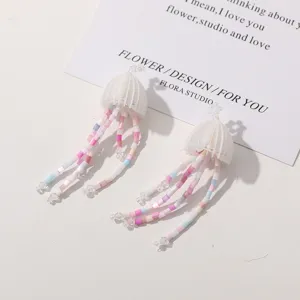 Handmade beaded jellyfish flower pendant earrings, sweet fairy style DIY jewelry accessory.