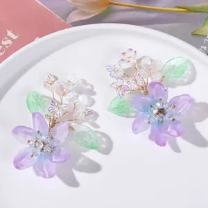 Handcrafted crystal flower hair clip detail, purple gradient floral hairpin for Hanfu styling.