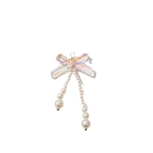 Iridescent bow pearl pendant DIY handmade beaded hair clip earrings jewelry accessory.