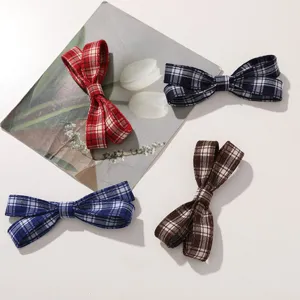 Korean style plaid ribbon hair clip detail showing four colors red blue navy brown for DIY accessories.