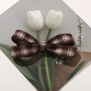 Korean vintage plaid bow hair clip, exquisite fabric design for daily sweet styling details.