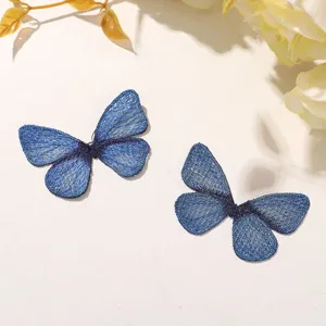 Patch papillon brodé au fil d'or bleu pour accessoires de cheveux DIY et déco vêtements.