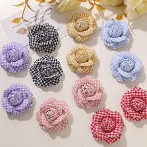 Korean style plaid camellia fabric flowers for DIY hair clips and clothing accessories.
