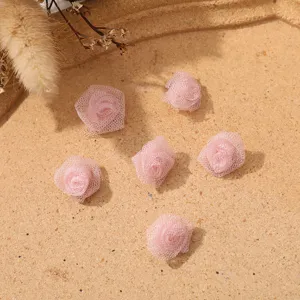 Pink mesh miniature rose flower buds for DIY crafts, apparel accessories, and hair decor.