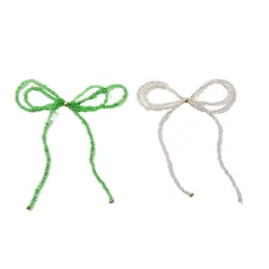 Handgemachte Glasperlen Schleife Schmuck Accessoires, elegantes gruen weiss minimalistisch.