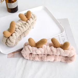 Cute plush dragon horn headband for women, soft cosmetic hair band for face washing daily wear.