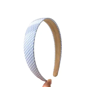 Blue and white gingham fabric headband, stylish and versatile hair accessory for daily wear.
