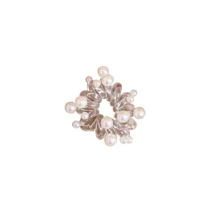 Elastico per capelli trasparente a filo di telefono con perle e braccialetto per look eleganti.